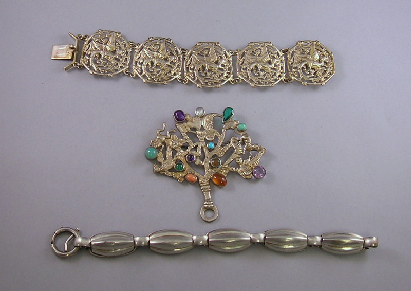 Appraisal: Three Silver Jewelry Items an Italian silver griffin bracelet marked