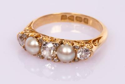 Appraisal: An Edwardian diamond and pearl ring in an ct yellow