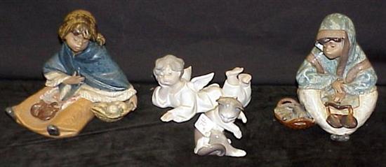 Appraisal: Four Lladro figures including a reclining angel cat with mouse