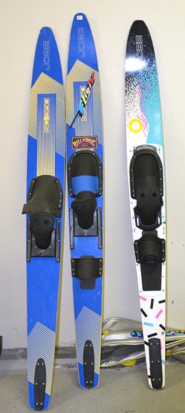 Appraisal: PAIR OF WATERSKIS AND A SINGLE WATER SKI