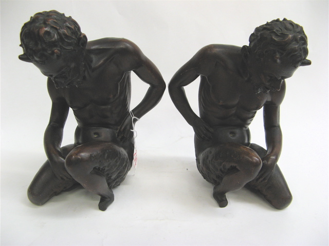 Appraisal: PAIR CARVED STAINED WOOD FAUNI SCULPTURES in opposing seated positions