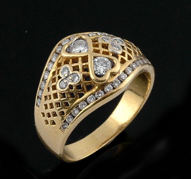 Appraisal: A diamond dress ring The ct gold tapered filligree band