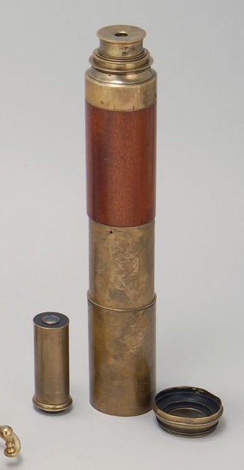 Appraisal: MAHOGANY AND BRASS THREE-DRAW TELESCOPE With end caps Length extended