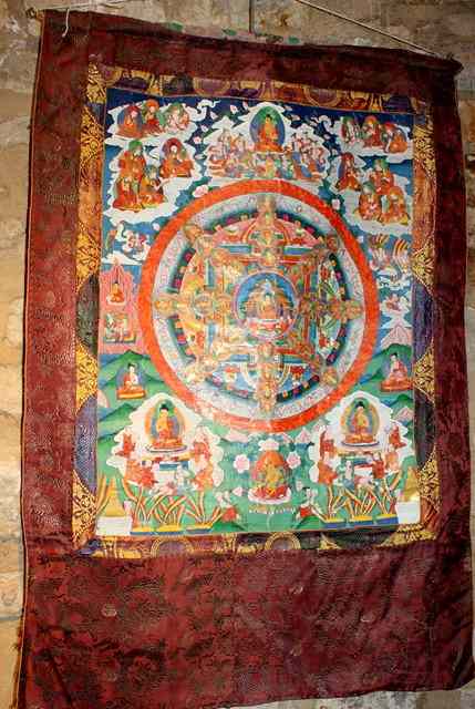 Appraisal: AN ANTIQUE TIBETAN TANKA depicting an elaborate scene of deities