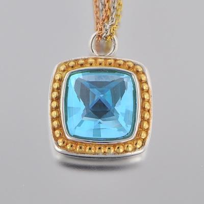 Appraisal: A Blue Topaz and Two Tone Gold Pendant with Chain