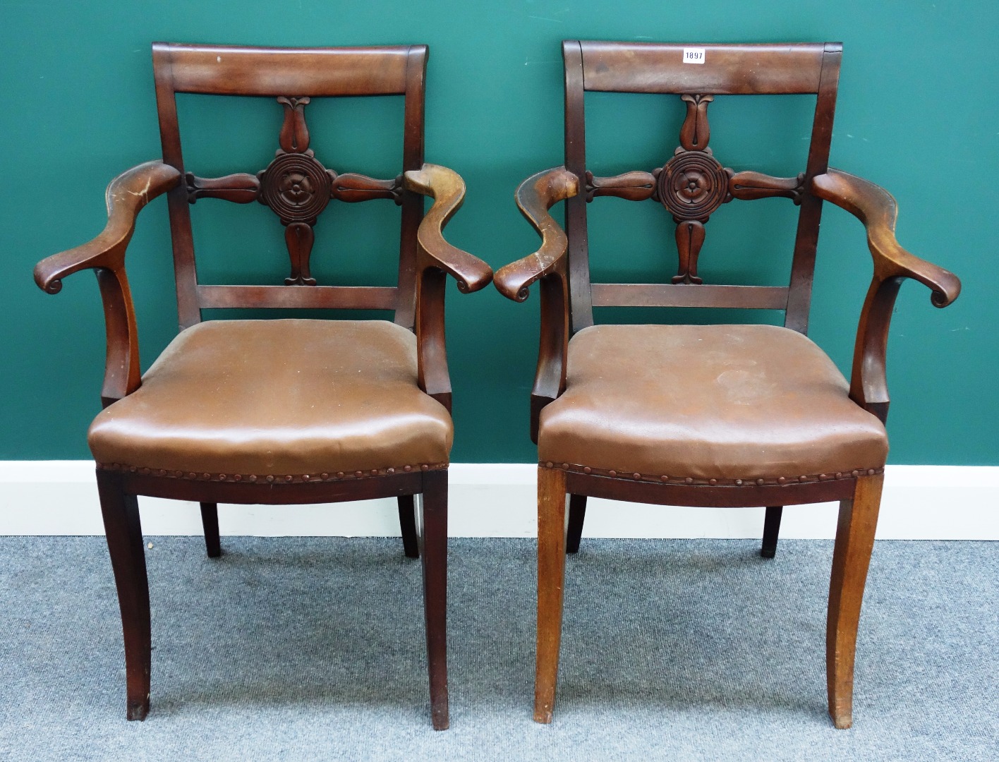 Appraisal: A pair of th century mahogany carver chairs with Tudor