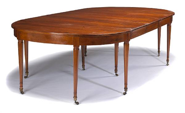 Appraisal: A Directoire gilt bronze mounted walnut dining table late th