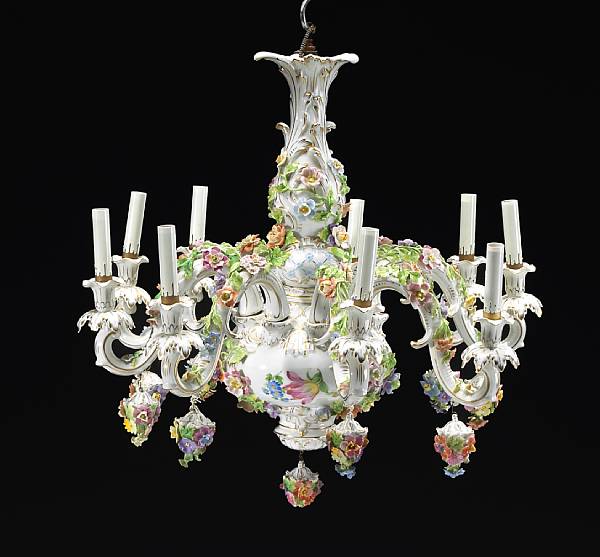 Appraisal: A Dresden style porcelain floral encrusted nine light chandelier th