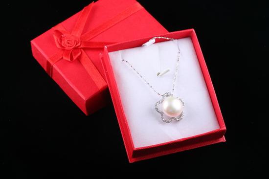 Appraisal: WHITE MABE PEARL AND DIAMOND SIMULANT NECKLACE Sterling silver floral