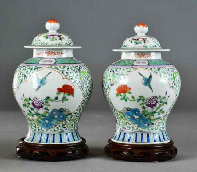 Appraisal: Pr Chinese Qing Porcelain Jars And coversDecorated in the Famille