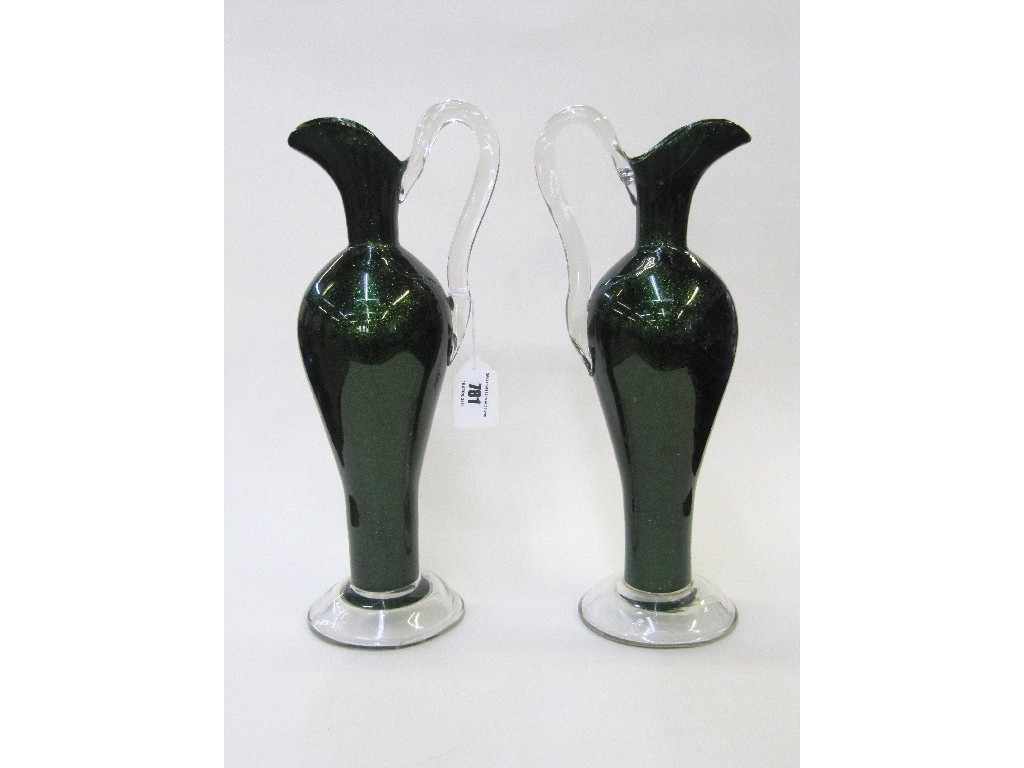 Appraisal: Pair of Victorian glitter glass wine jugs and a Czechoslovakian