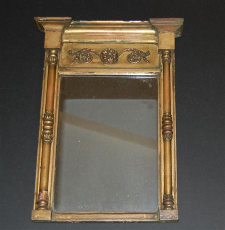 Appraisal: A small Regency giltwood pier glass with foliate scroll frieze