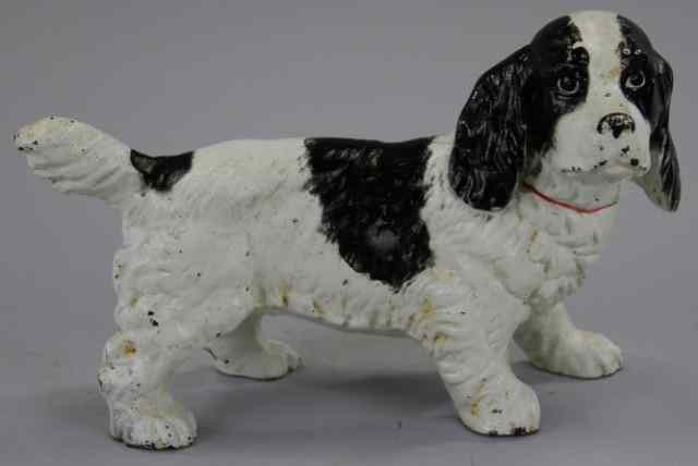 Appraisal: a COCKER SPANIEL DOORSTOP Hubley full figured casting depicts popular