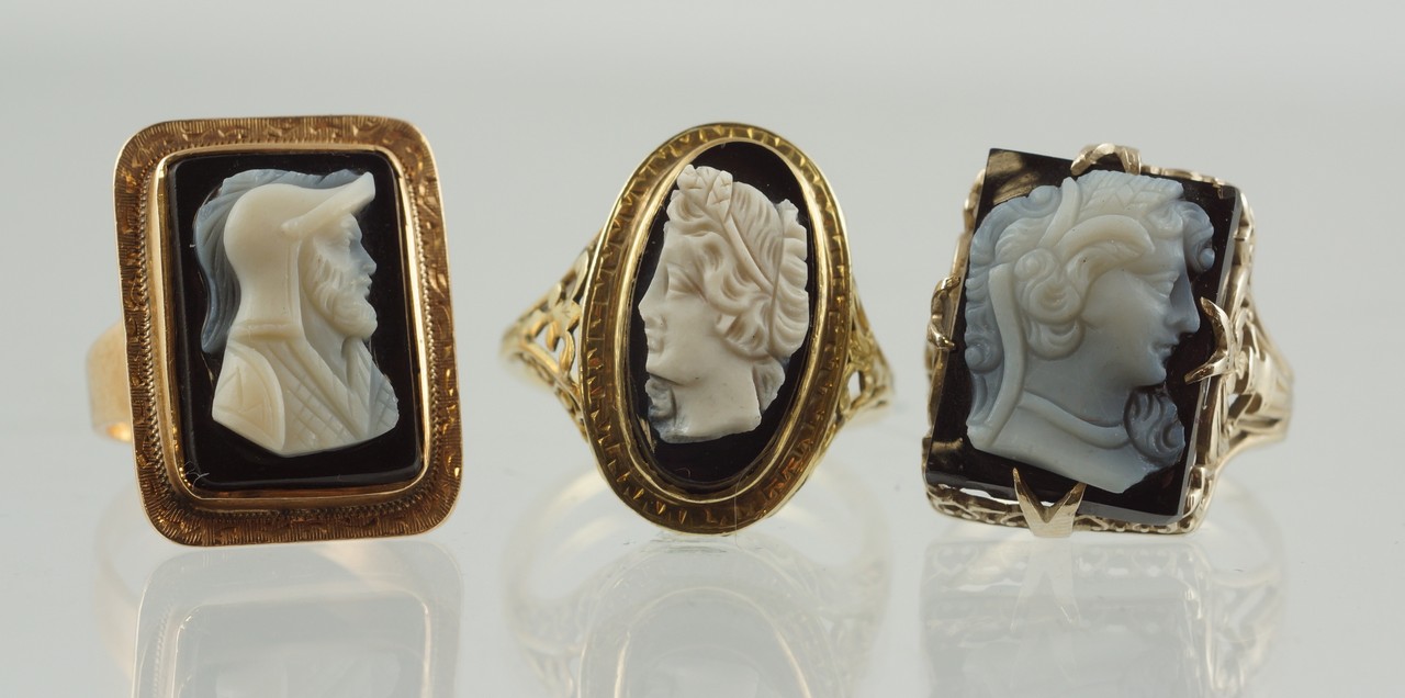 Appraisal: white on black carved cameo rings classical busts stamped K