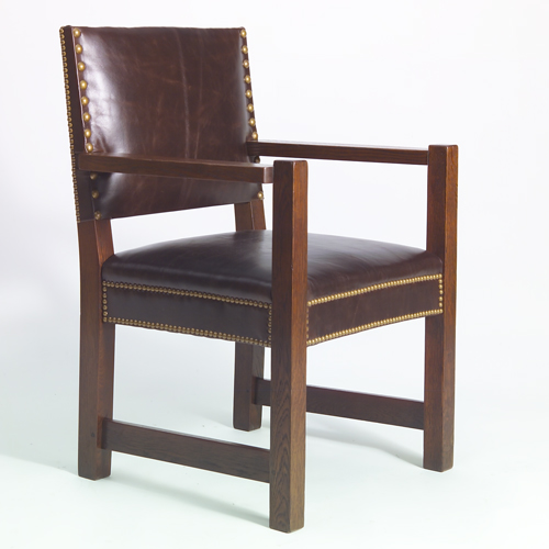 Appraisal: GUSTAV STICKLEY Armchair with tacked-on leather seat and back Refinished