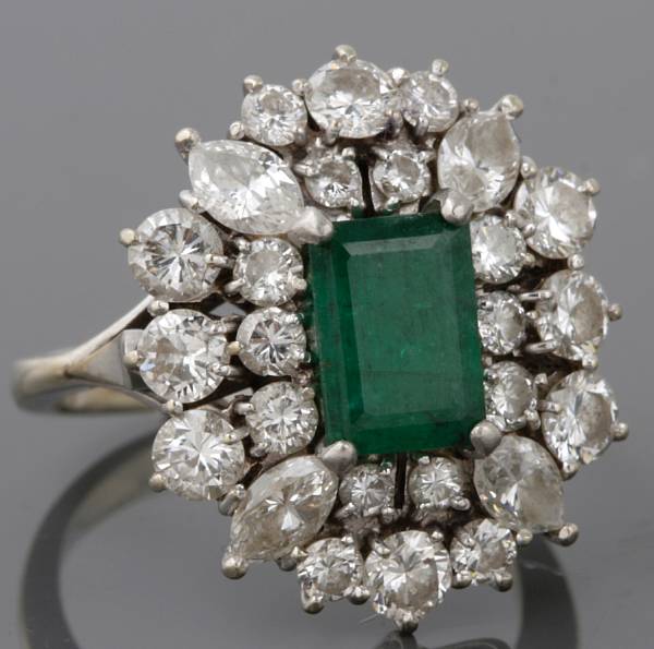 Appraisal: An emerald diamond and white gold ring emerald cut emerald