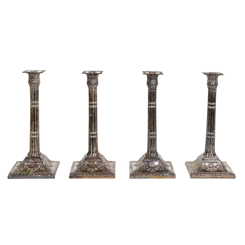 Appraisal: EGYPTIAN REVIVAL SILVERPLATE CANDLESTICK COLLECTION matching candlesticks with bobeches vertical