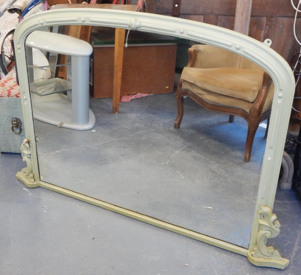 Appraisal: A Victorian overmantel mirror with and arched moulded frame later