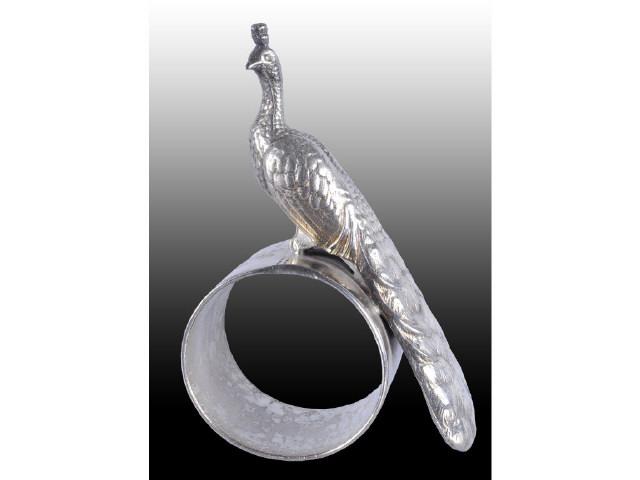 Appraisal: Peacock Perches on Top Figural Napkin Ring Description Peacock's long