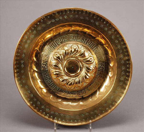 Appraisal: A Nuremberg brass alms dish late th century the raised