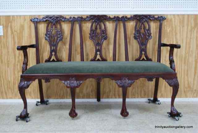 Appraisal: Carved Mahogany Settee w Cushioned SeatIs made of sold mahogany