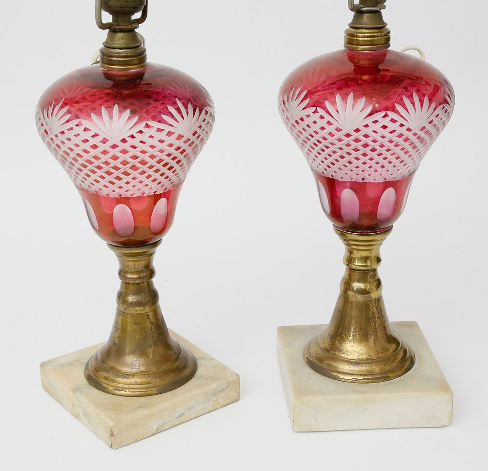 Appraisal: Pair of Ruby Cut to Clear Overlay Kerosene Lamps circa