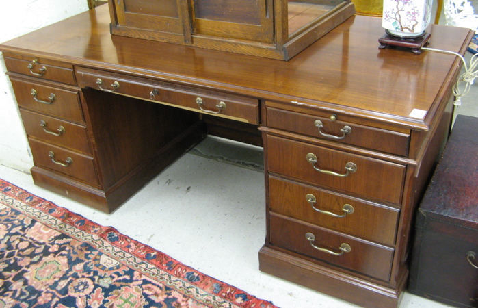 Appraisal: FLAT-TOP MAHOGANY EXECUTIVE DESK American the rectangular top spanning twin