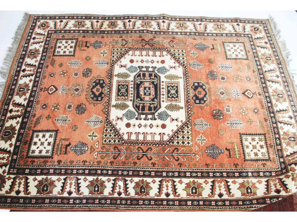 Appraisal: EASTERN RUG OF CAUCASIAN STYLE with large centre octagonal medallion