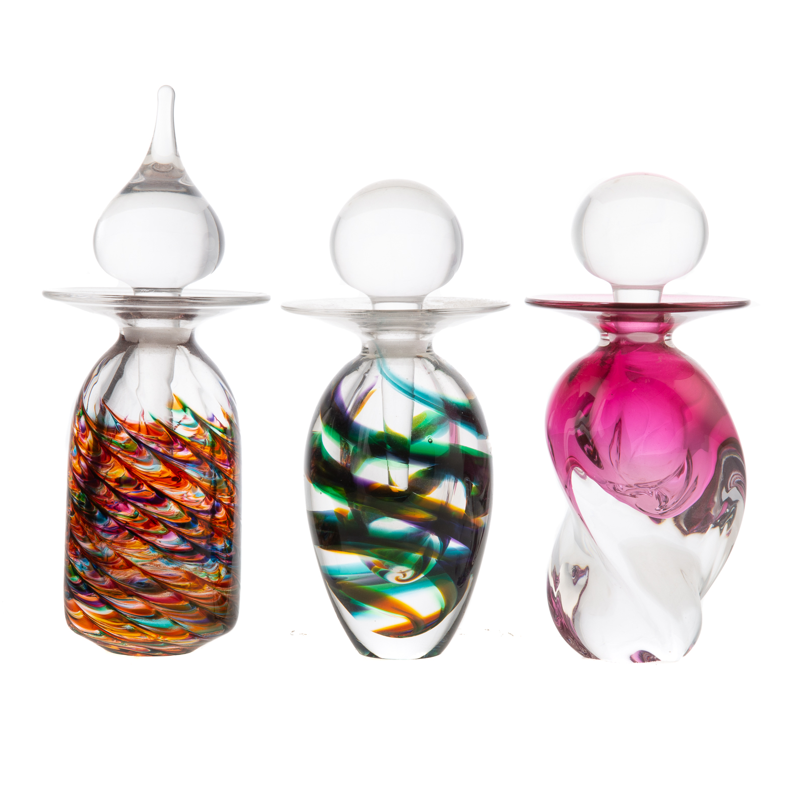 Appraisal: THREE ART GLASS SCENT BOTTLES BY MICHAEL TRIMPOL Elaborately designed