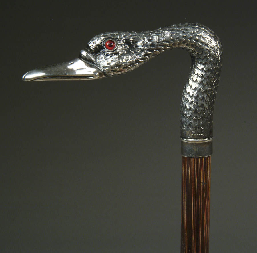 Appraisal: STERLING SWAN HEAD CANE L-shaped swan head is English hallmarked