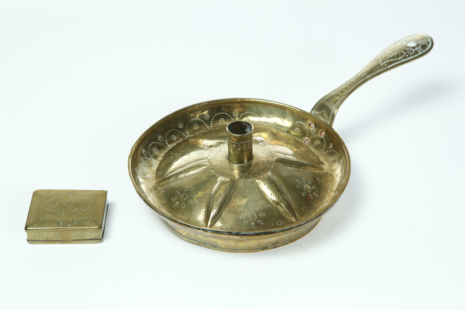 Appraisal: BRASS EUROPEAN CHAMBERSTICK AND SNUFF BOX Eighteenth century Large chamberstick