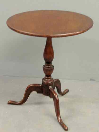 Appraisal: Cherry candlestand early th c with a circular top urn