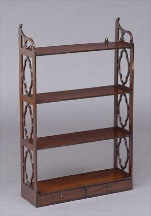 Appraisal: GEORGE III MAHOGANY HANGING SHELF Incorporating shelves with pierced quatrefoil