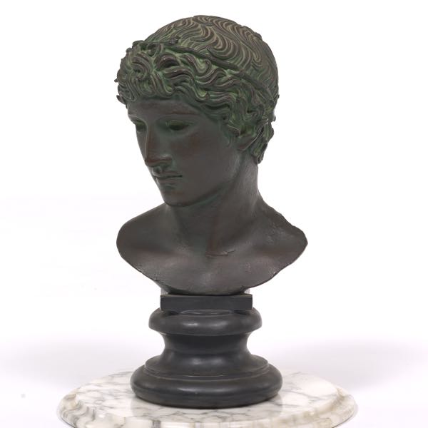 Appraisal: ANTINOUS BUST THE LOUVRE MUSEUM REPRODUCTION ON ITALIAN MARBLE COLUMN