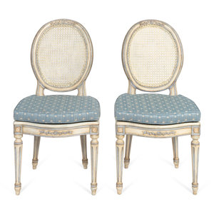 Appraisal: A Pair of Louis XVI Style White-Painted and Caned Chaises