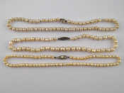 Appraisal: A mixed lot comprising three cultured pearl necklets longest approx