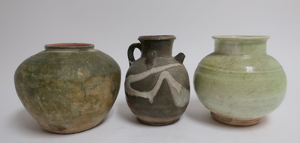 Appraisal: Phosphatic Splashed Ewer and Tang Style Vases The ewer and