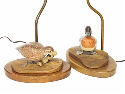 Appraisal: Two carved and painted bird figures th century