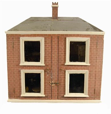 Appraisal: A painted pine doll's house the pitched roof with a