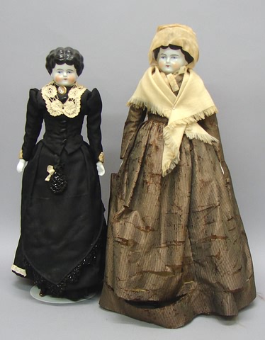 Appraisal: Pair of china Lowbrow dolls Has black hair original cloth