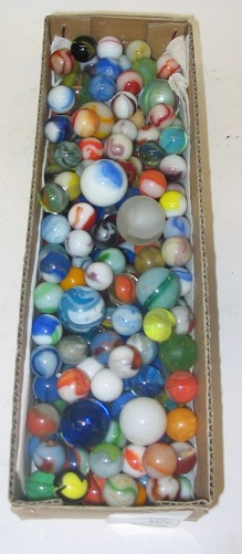 Appraisal: A COLLECTION OF OVER GLASS MARBLES in an array of