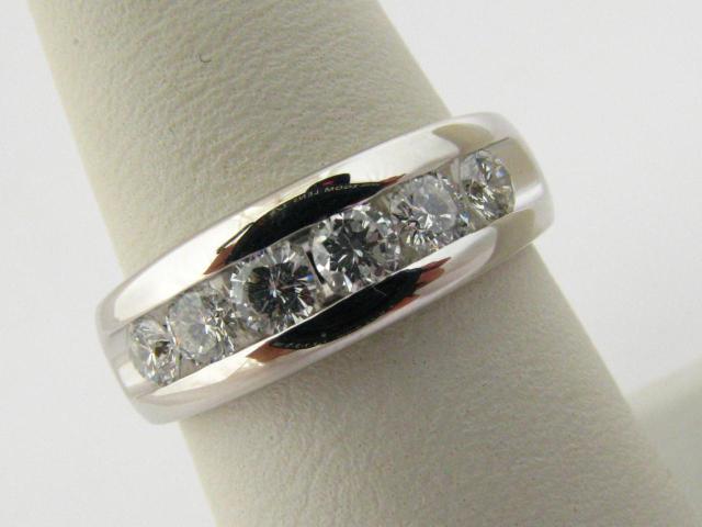 Appraisal: k white gold gentleman's diamond wedding band with round brilliant