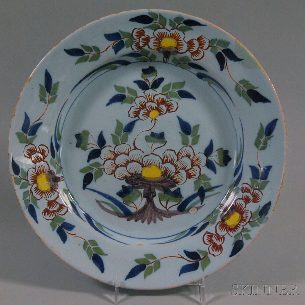 Appraisal: Fazackerly-decorated Delft Plate England th century repair dia in Estimate