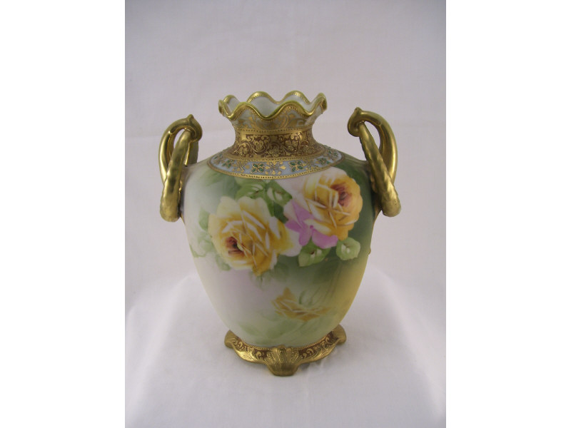 Appraisal: Nippon Handpainted Porcelain Vase Two ring handled porcelain vase with