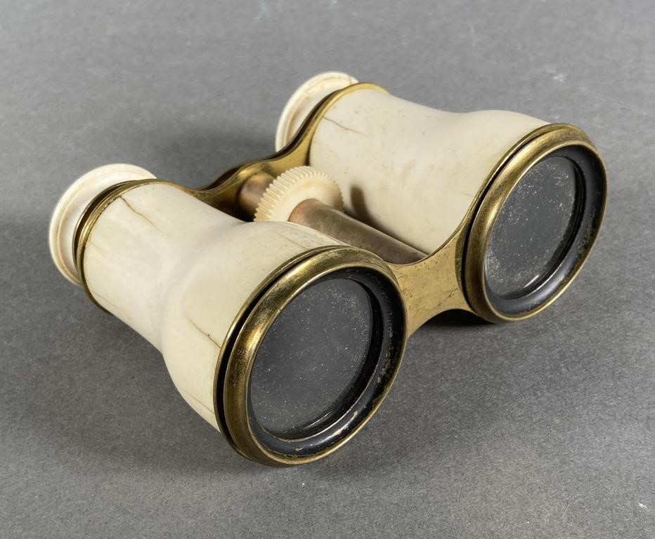 Appraisal: French ivory and gold toned brass opera glasses Measure across