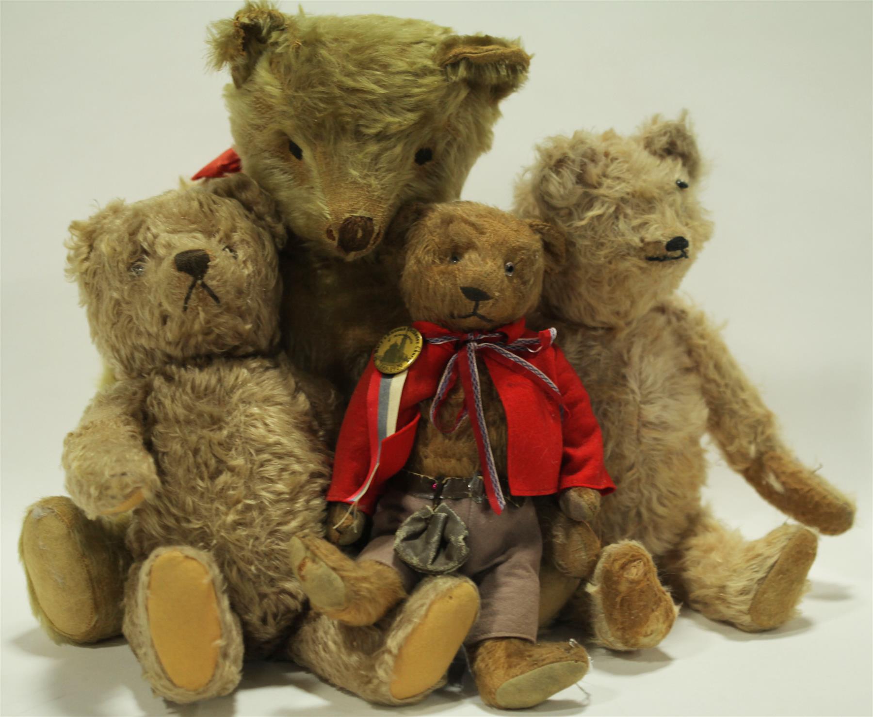 Appraisal: FOUR LIGHTER COLORED MOHAIR BEARS American or German early th