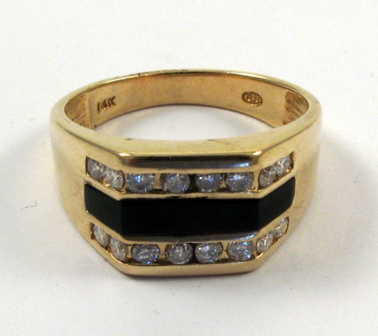 Appraisal: MAN'S BLACK ONYX AND DIAMOND RING k yellow gold and