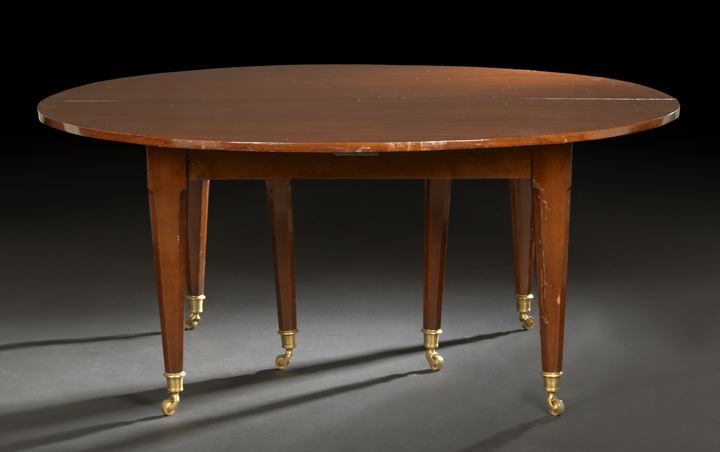 Appraisal: Directoire-Style Mahogany Dining Table th century the rounded table bisected