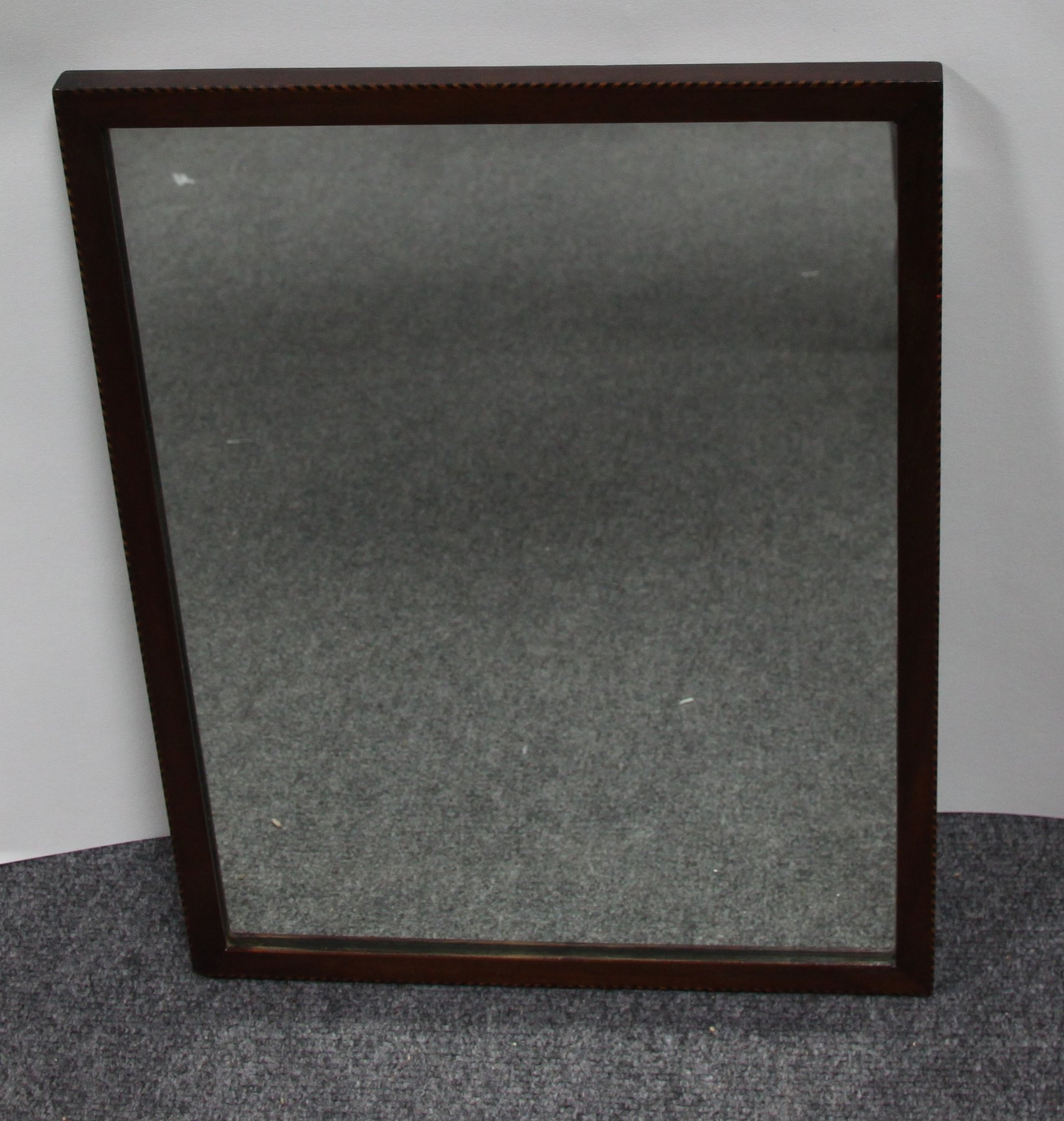 Appraisal: An early th Century mahogany chequer strung mirror cm x