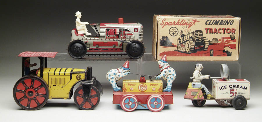 Appraisal: LOT OF FOUR WIND UP TIN TOYS Includes a Marx